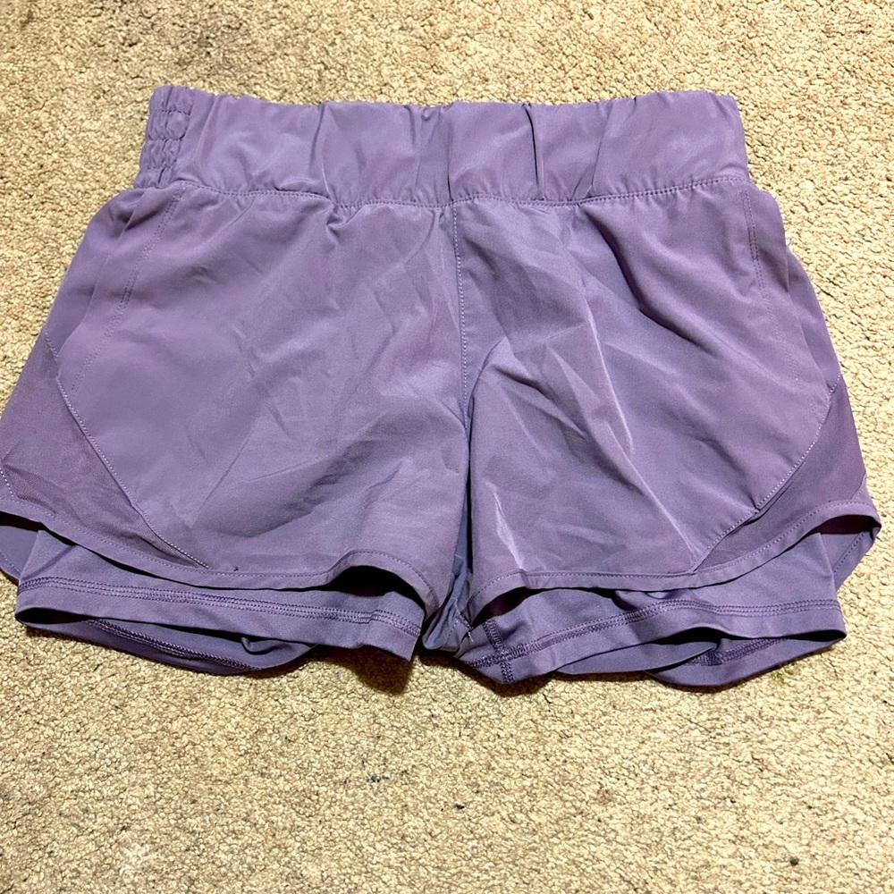 These shorts have only been worn once and have been washed ever since then.